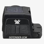 Närbild av baksidan på Vortex Defender-CCW rödpunktsikte med Vortex-logotyp, plus- och minusknappar samt sidoplats
