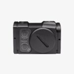 Sidovy av Aimpoint Acro C-2 rödpunktsikte som visar batterilock och knappar för ljusstyrka